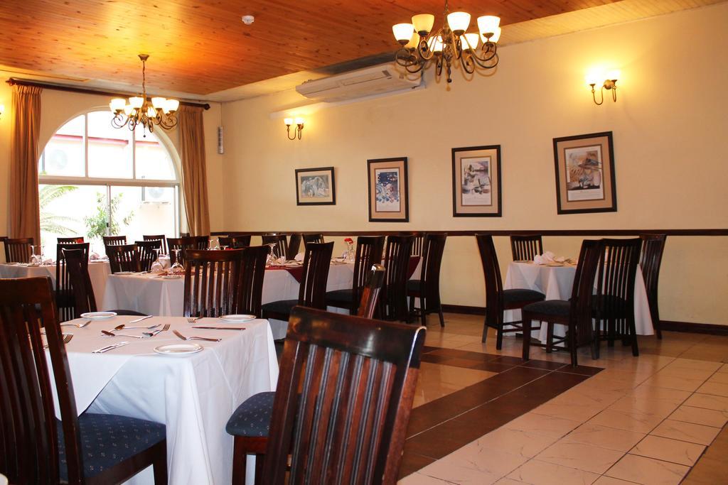 The George Hotel Manzini Luaran gambar