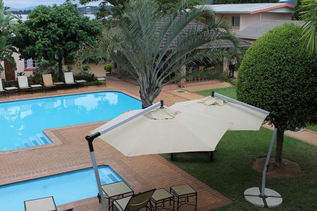 The George Hotel Manzini Luaran gambar