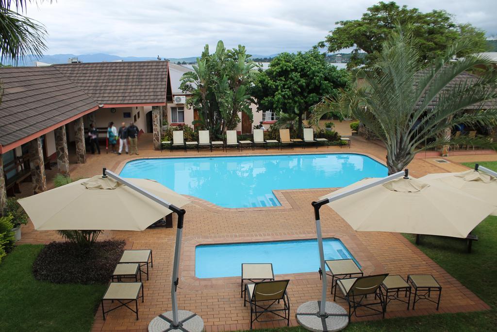 The George Hotel Manzini Luaran gambar