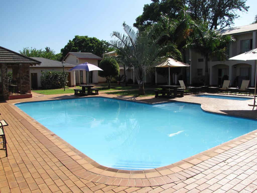 The George Hotel Manzini Luaran gambar