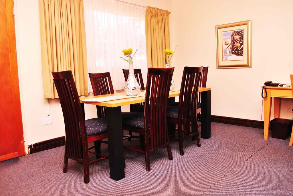 The George Hotel Manzini Luaran gambar